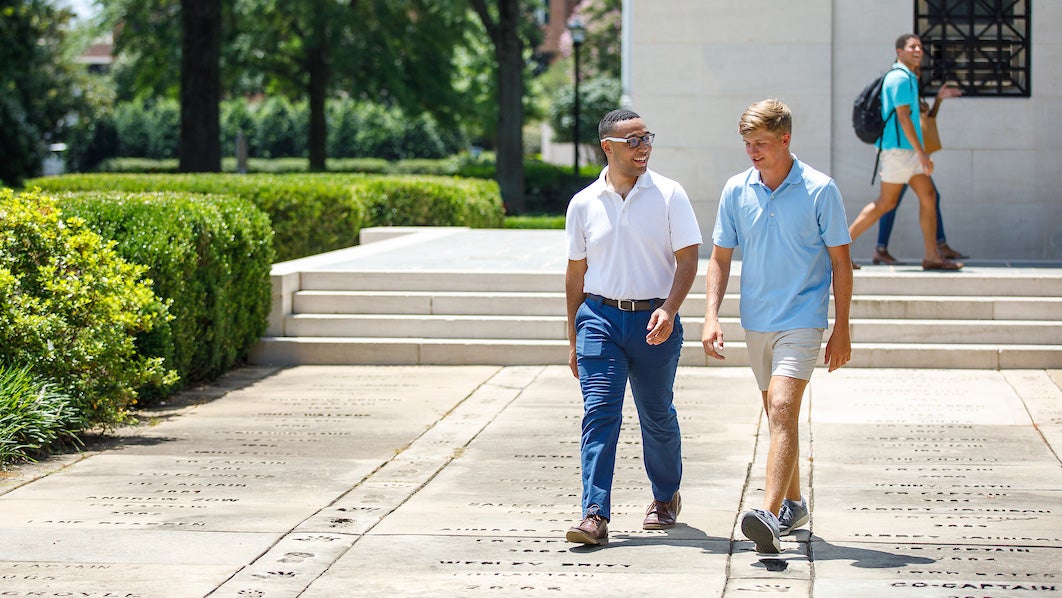 Students walking at Denny Chimes