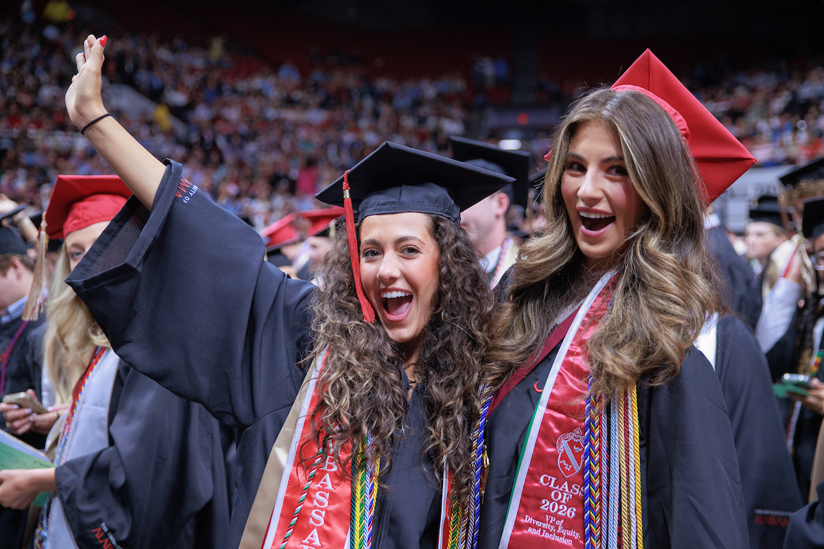 Students celebrate graduation.