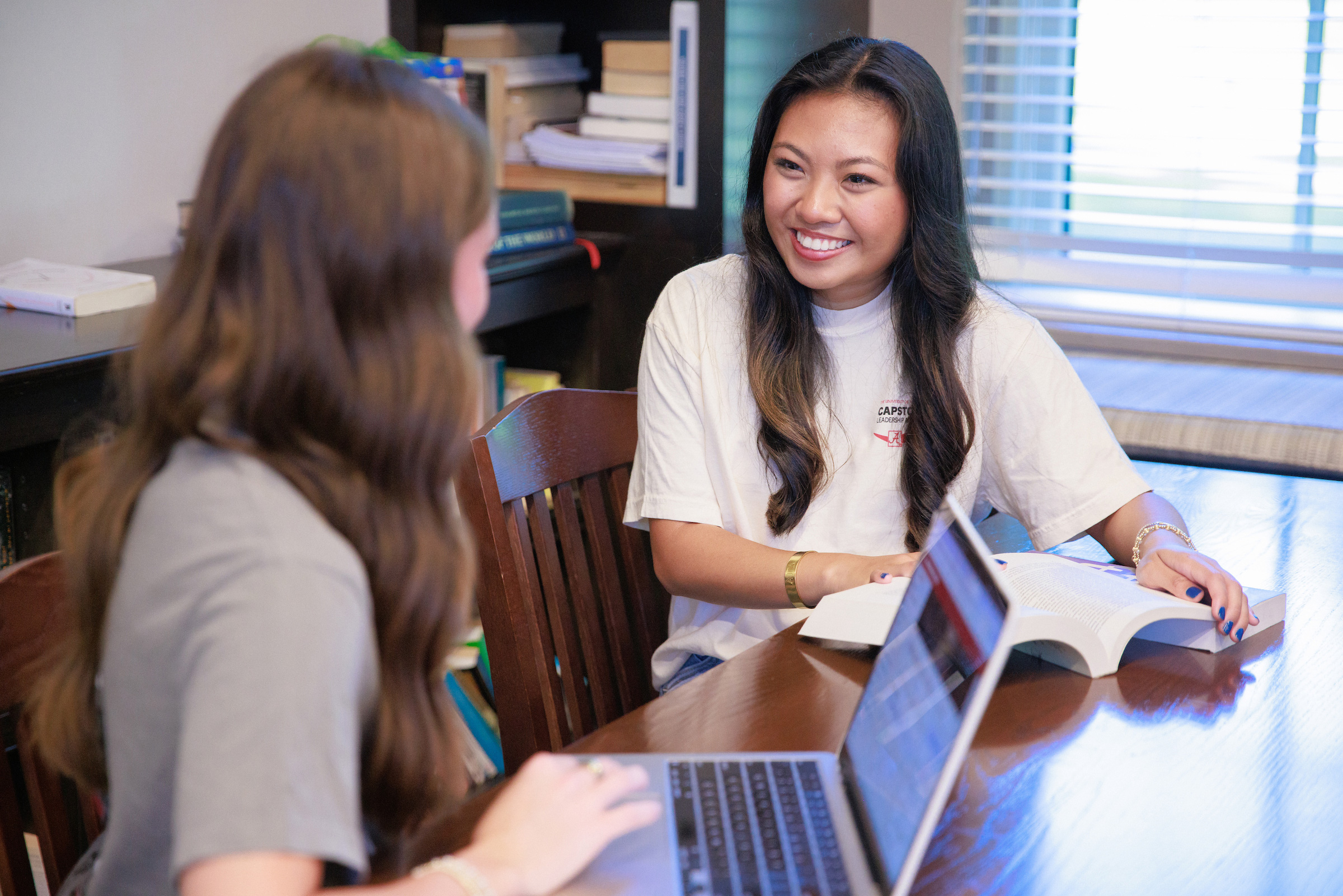 An advisor helps a student with classes